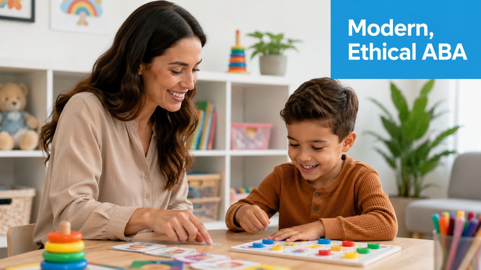 A therapist smiling while playing an educational learning game with a young boy at a table.